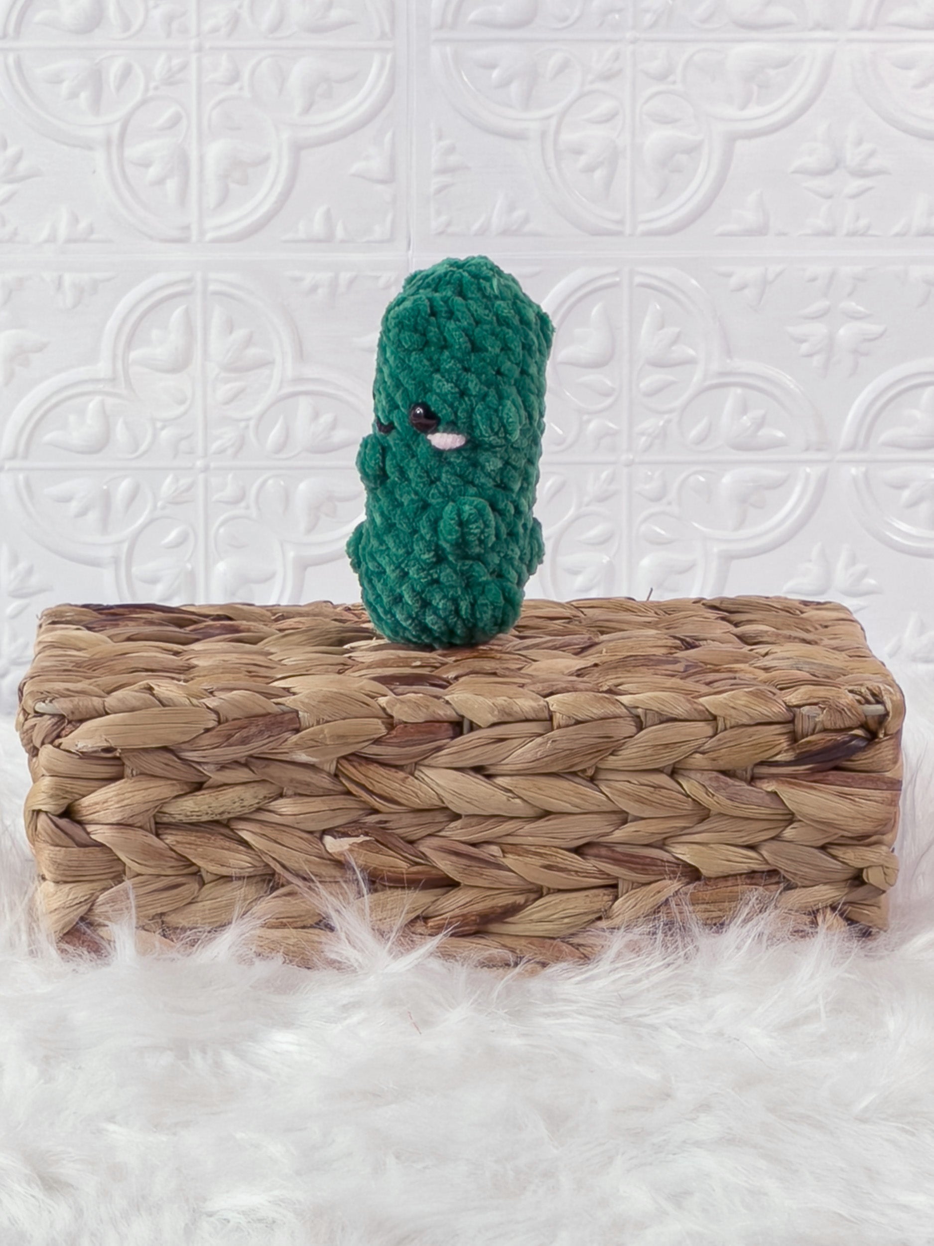 Handmade dill pickle crochet plushie with a playful food-inspired shape