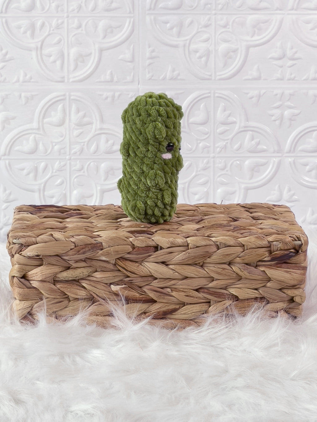 Handmade green, light dill pickle crochet plushie shown from the back