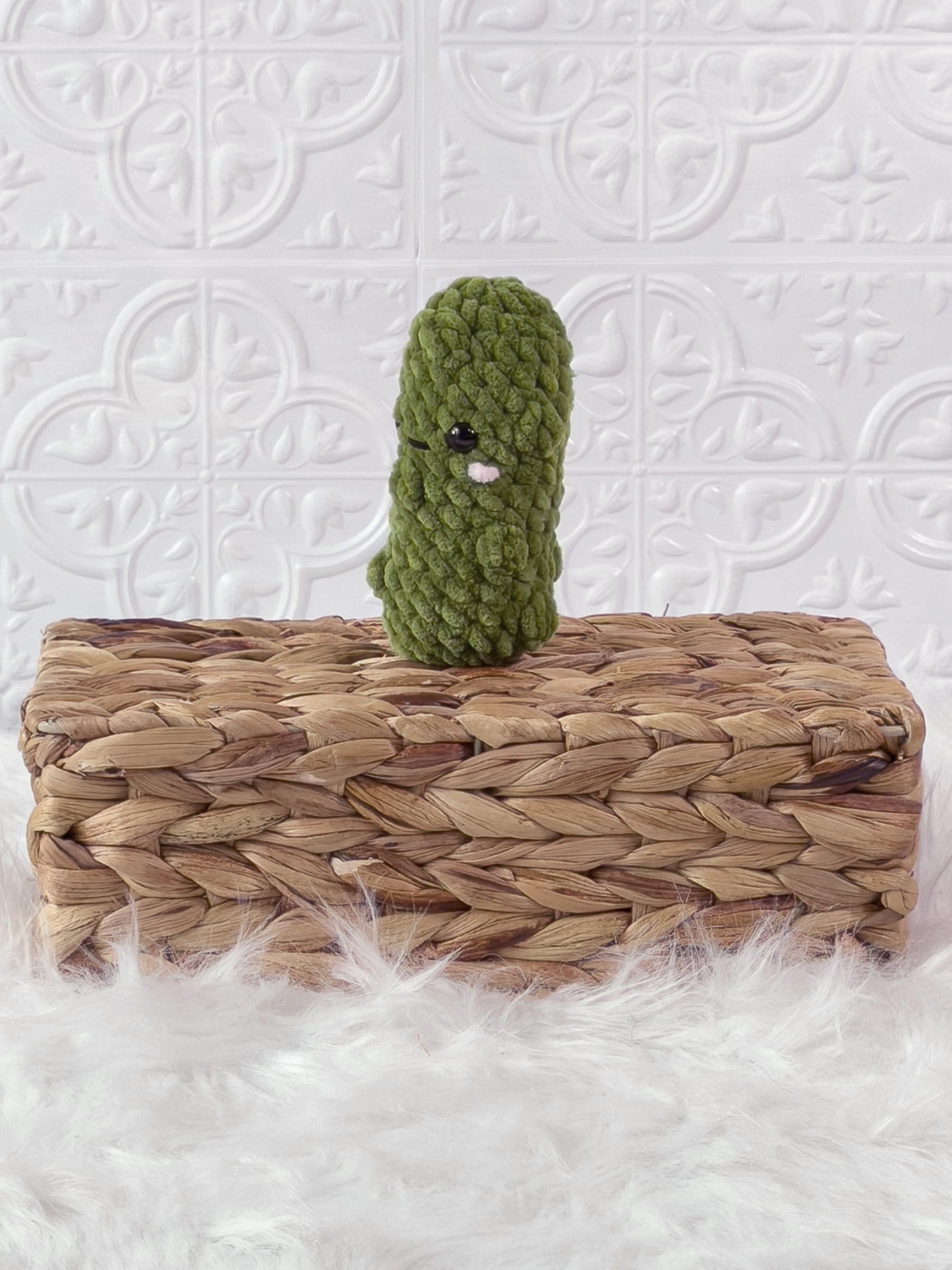 Handmade dill pickle crochet plushie with a playful food-inspired shape