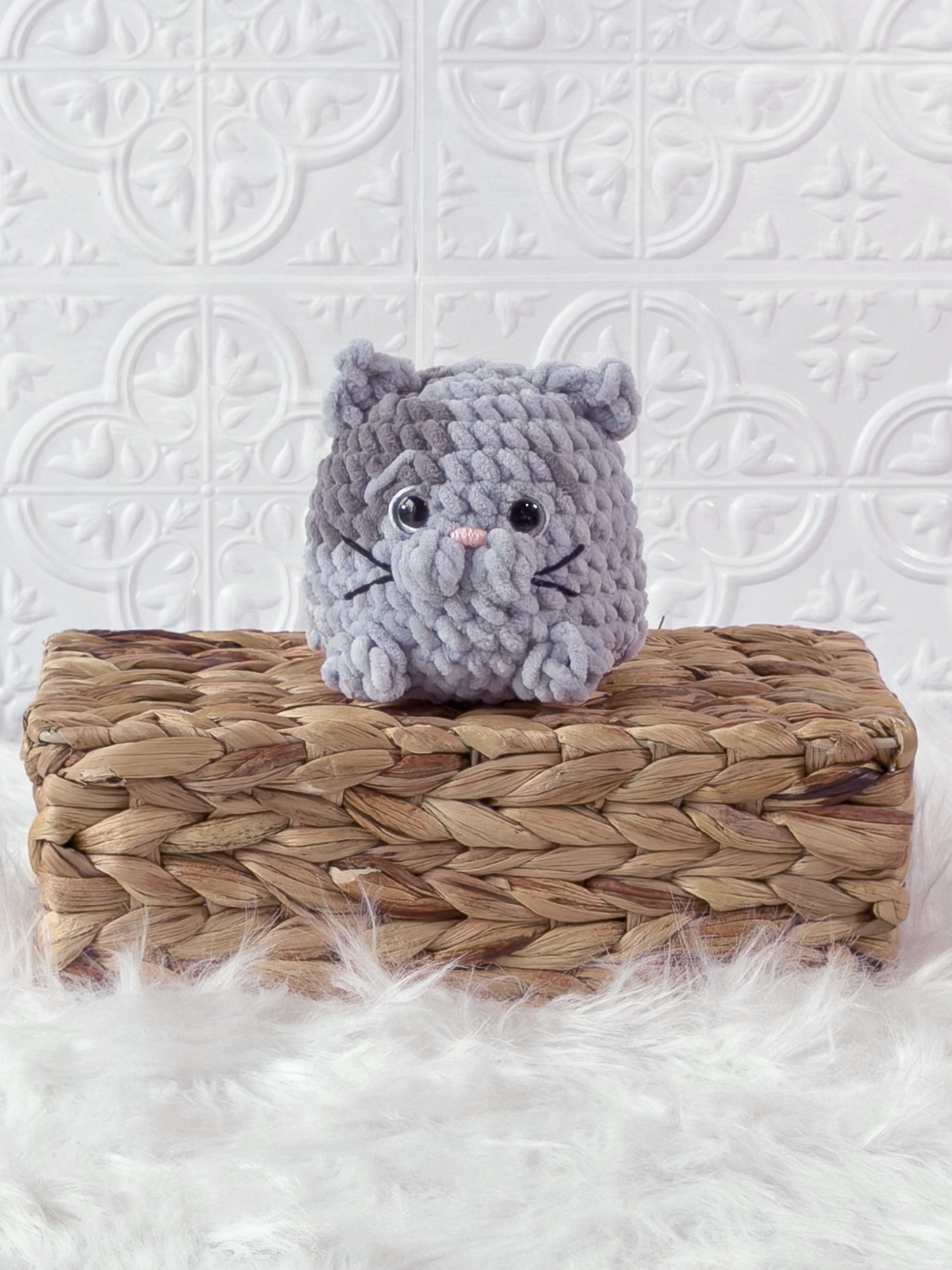 Handmade grey kitten crochet plushie shown from the front