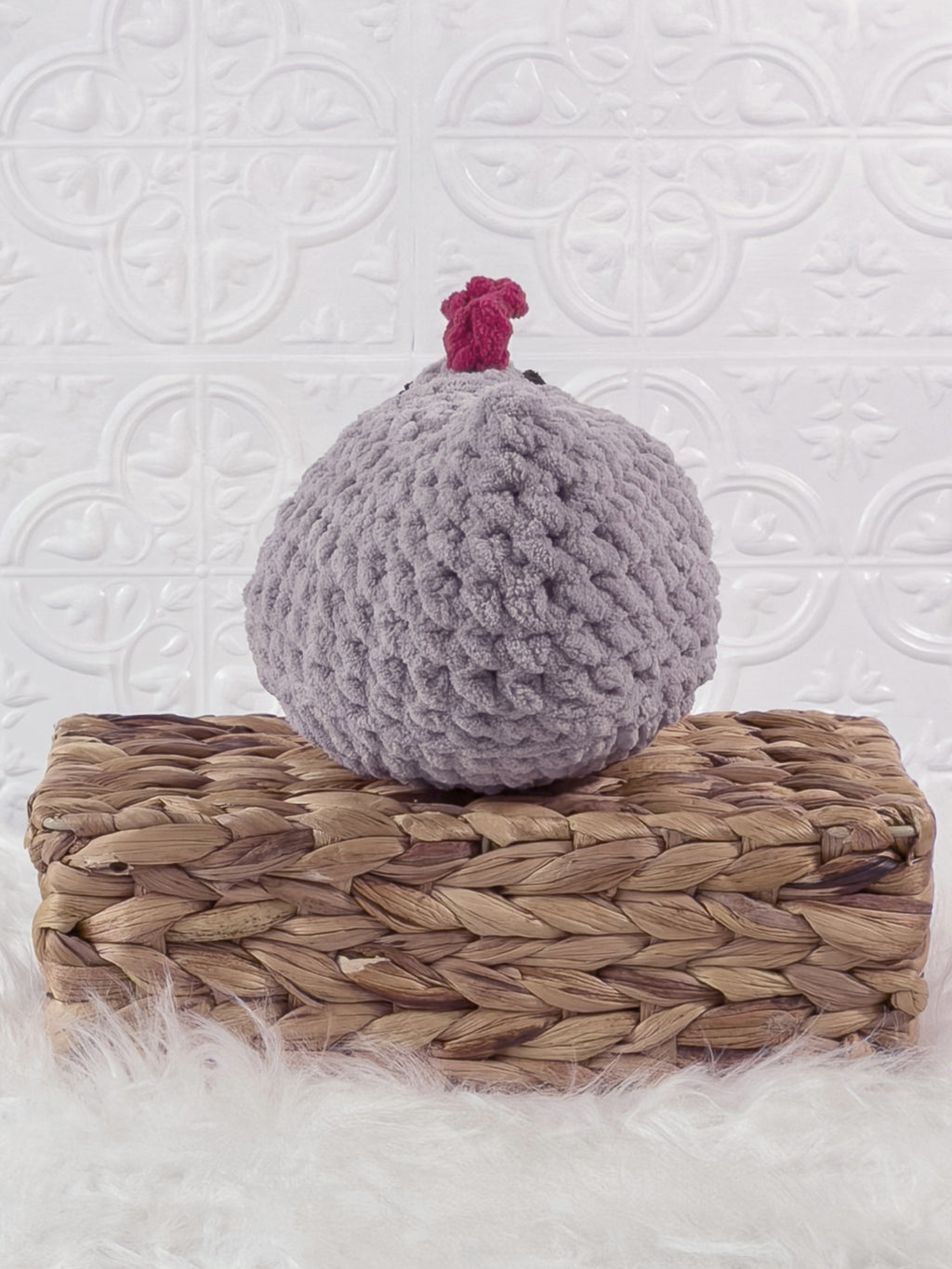 Handmade grey chicken crochet plushie shown from the back
