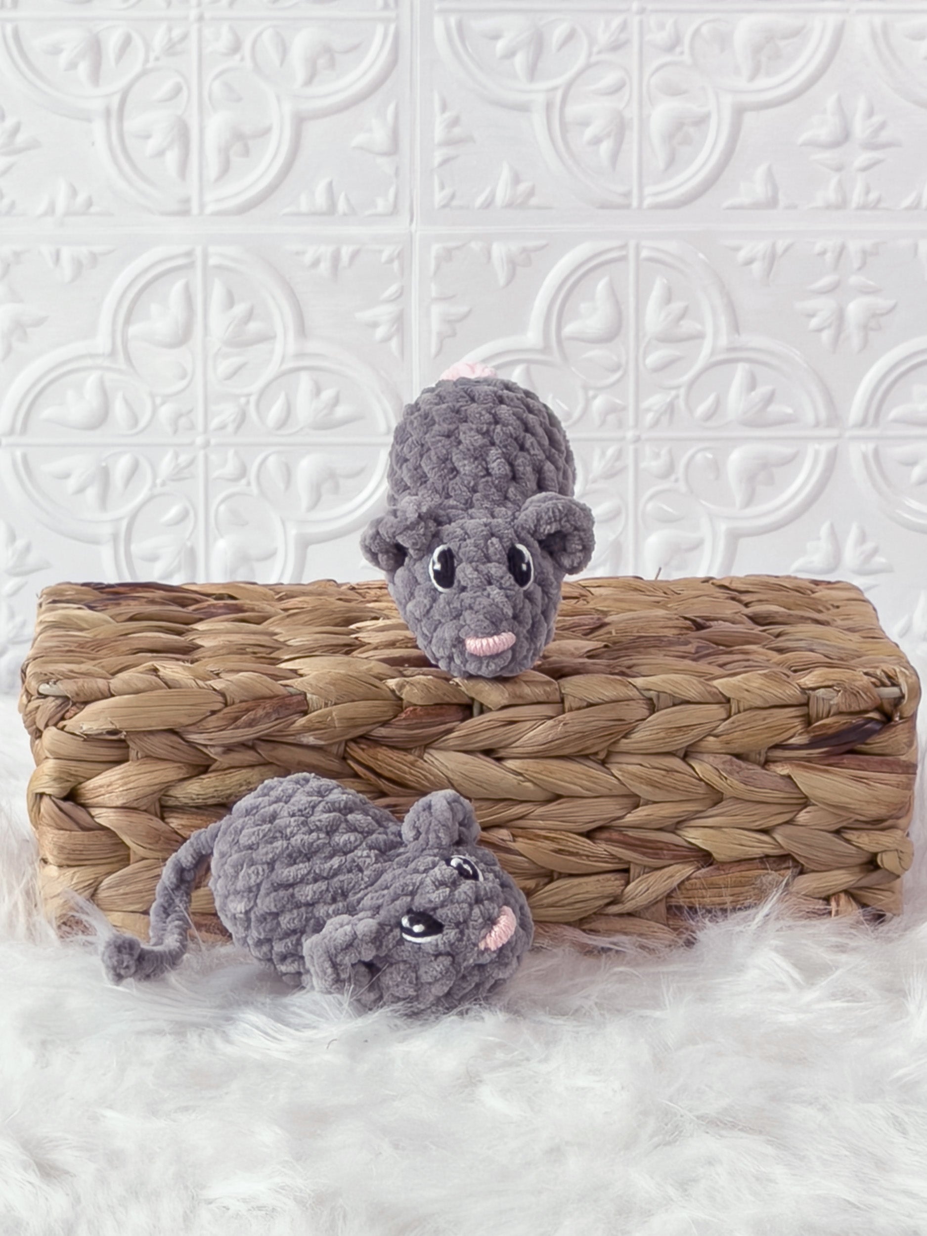 Handmade grey marnie the mouse crochet plushie shown from the front