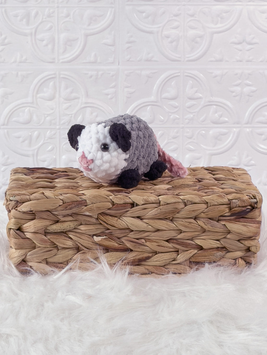 Handmade opossum crochet plushie shown from the front
