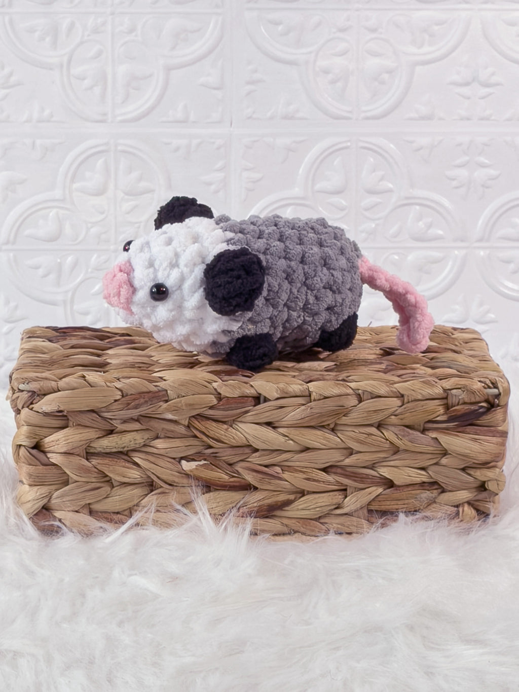 Handmade opossum crochet plushie shown from the front