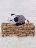 Handmade opossum crochet plushie shown from the front