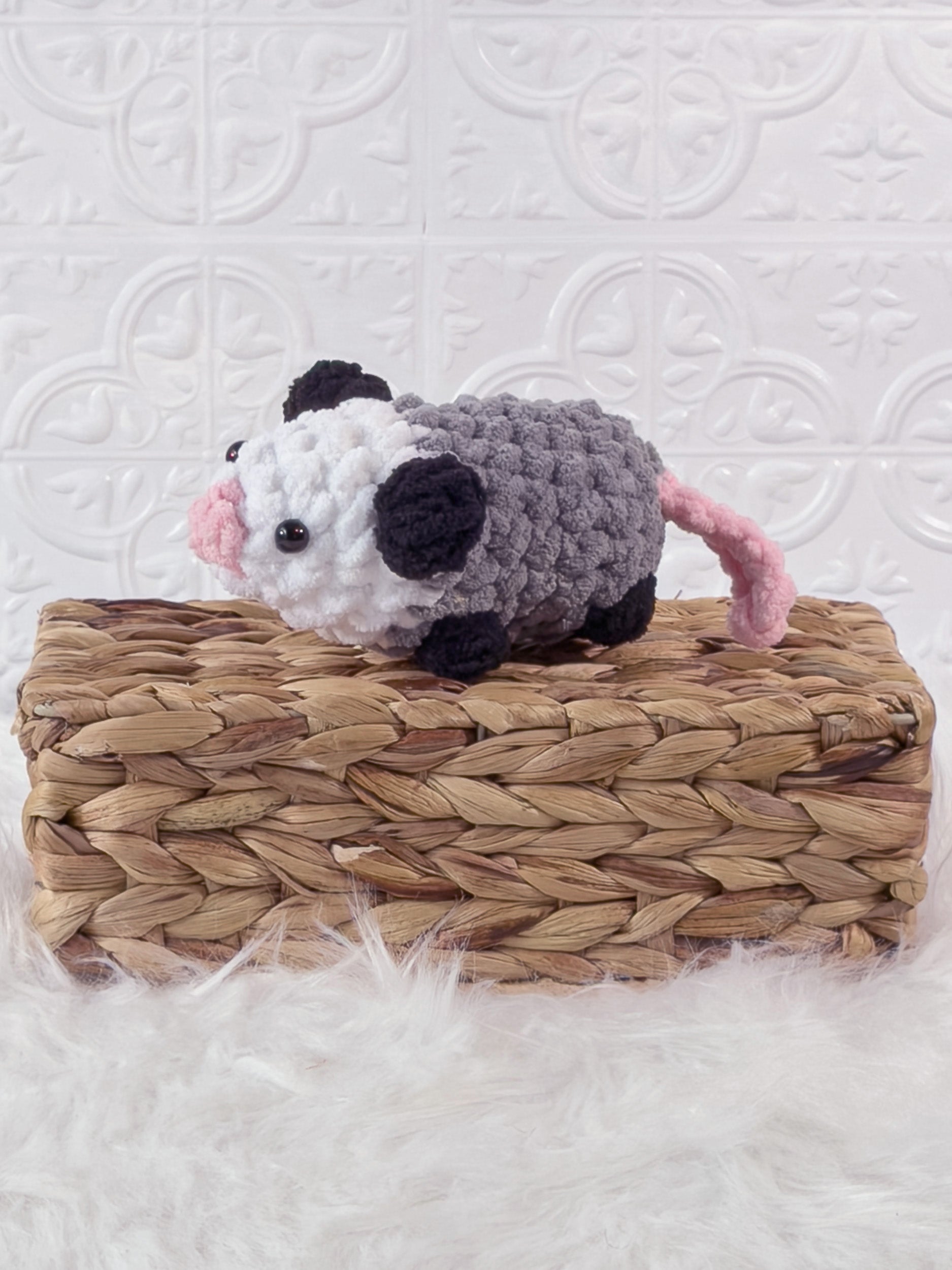 Handmade opossum crochet plushie shown from the front