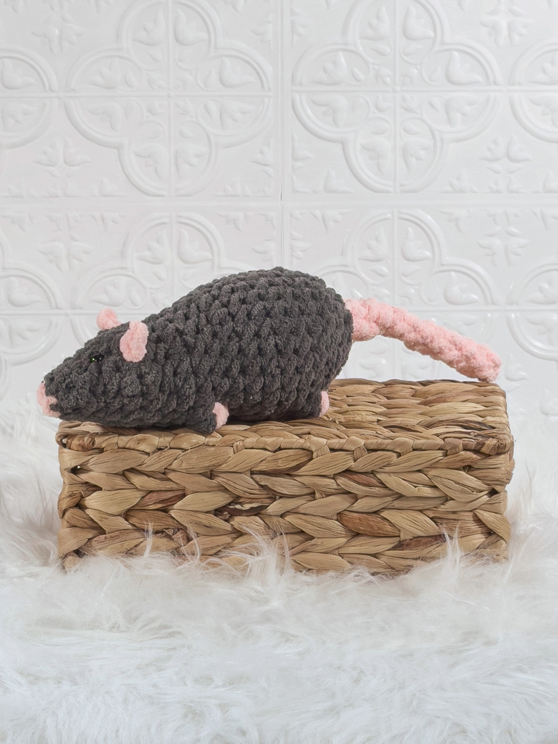 Handmade grey rat crochet plushie with rounded ears and a long soft body