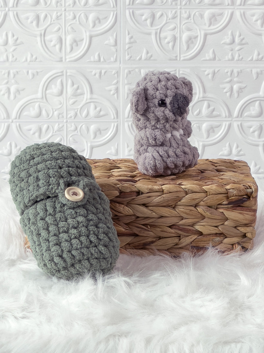 Handmade grey, green peek a boo koala in avocado crochet plushie shown from an angled view