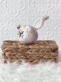 Handmade angry cat crochet plushie shown from the front