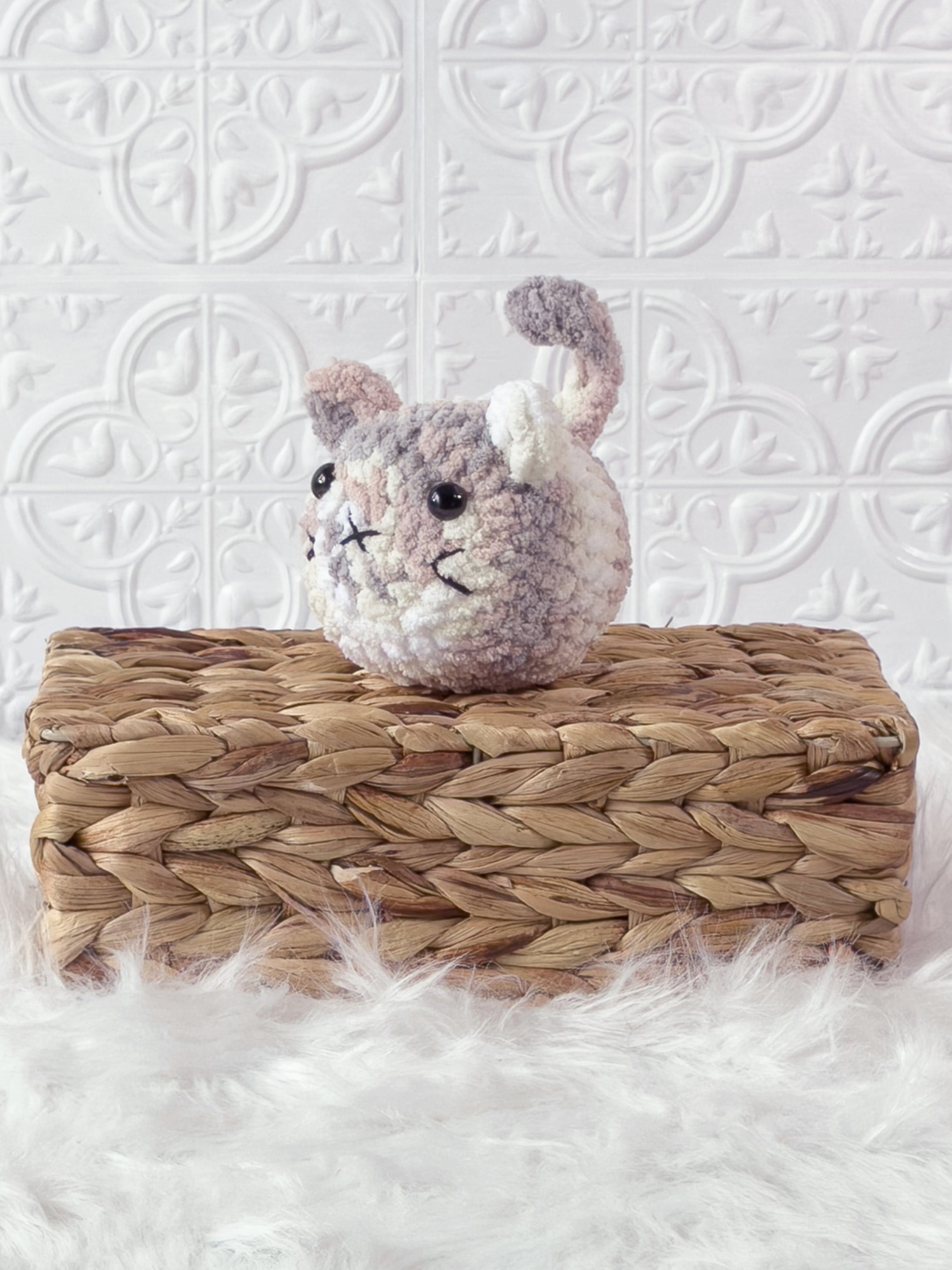 Handmade kitten crochet plushie shown from the front