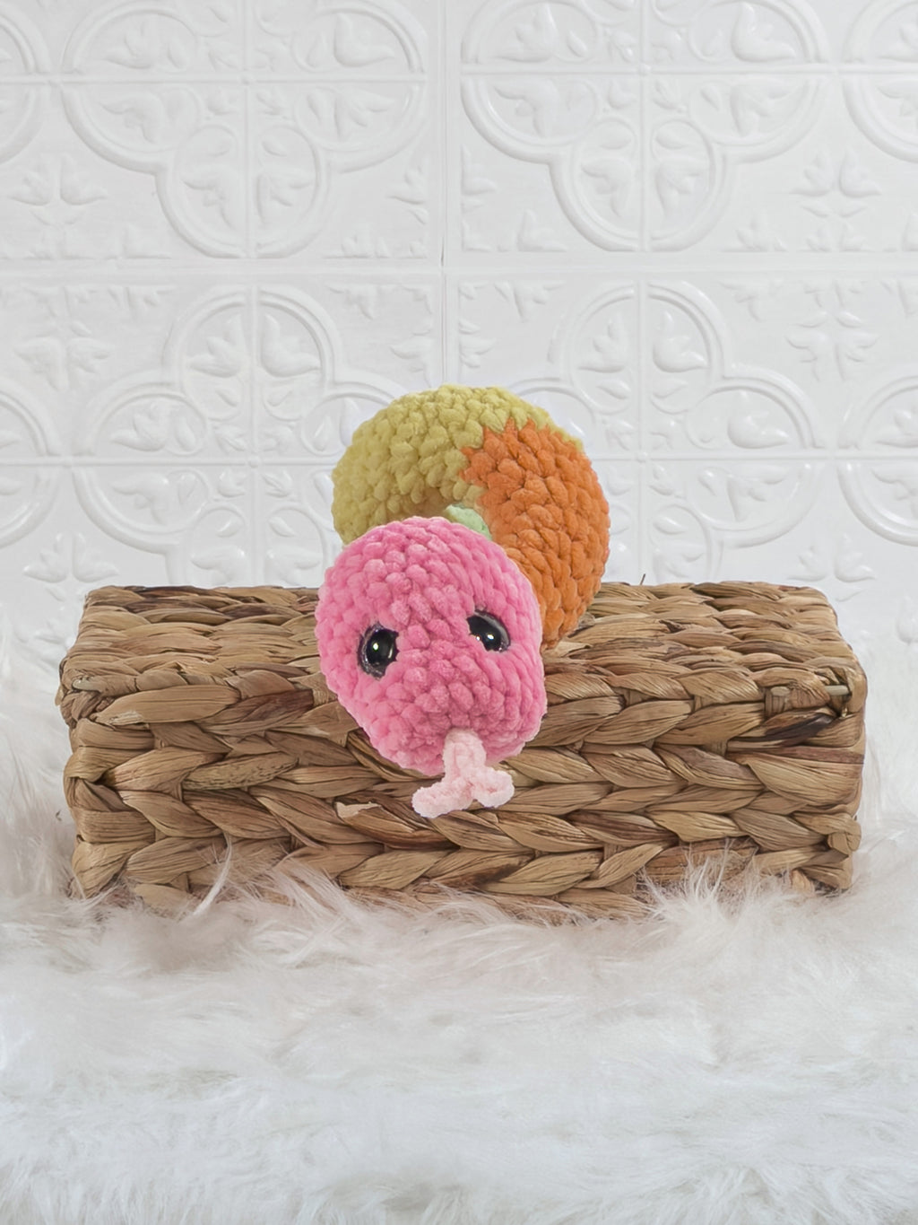 Handmade multicolor snake crochet plushie shown from the front