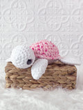 Handmade turtle crochet plushie shown from the front