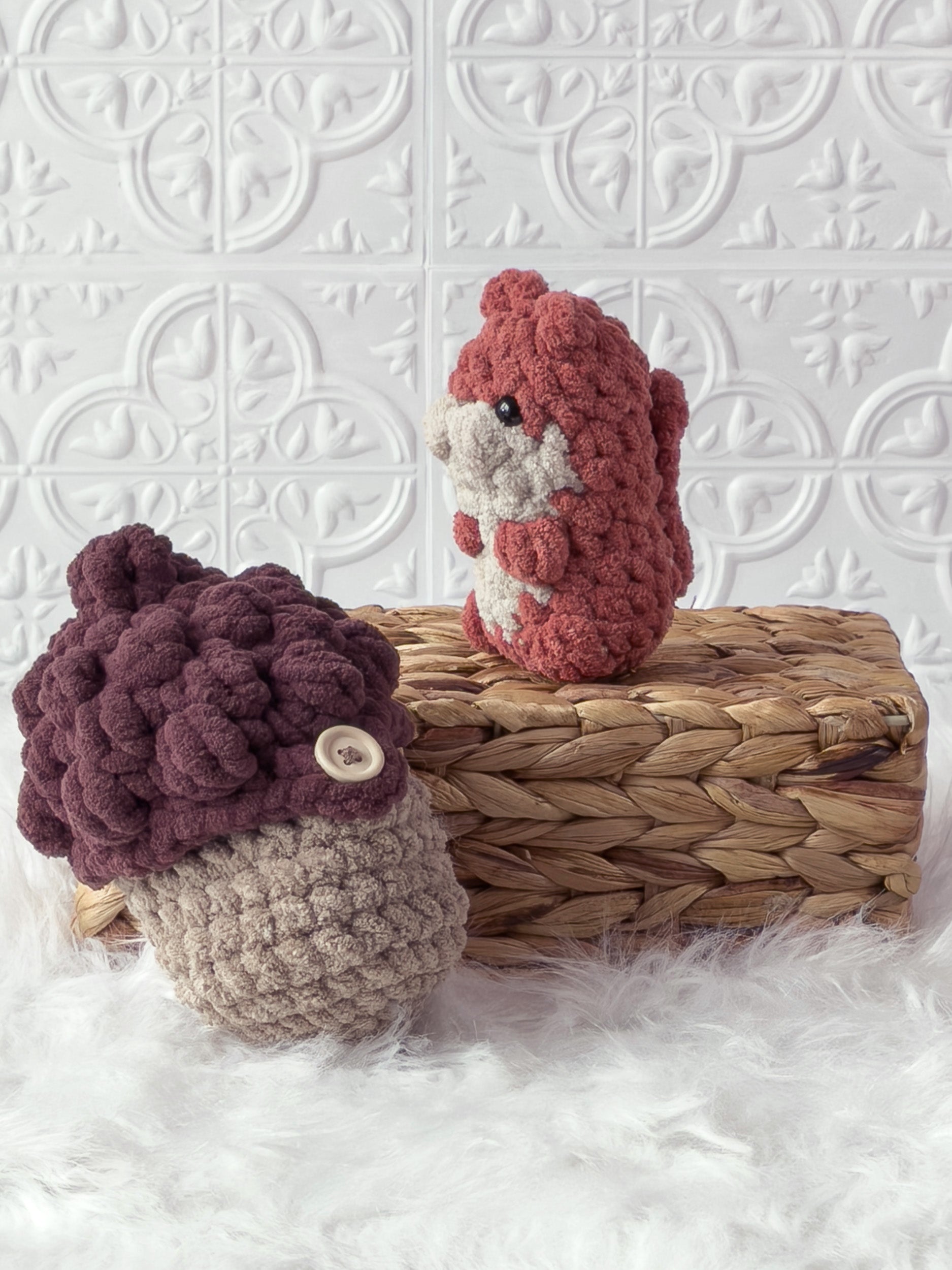 Handmade peek-a-boo squirrel crochet plushie inside a crochet acorn