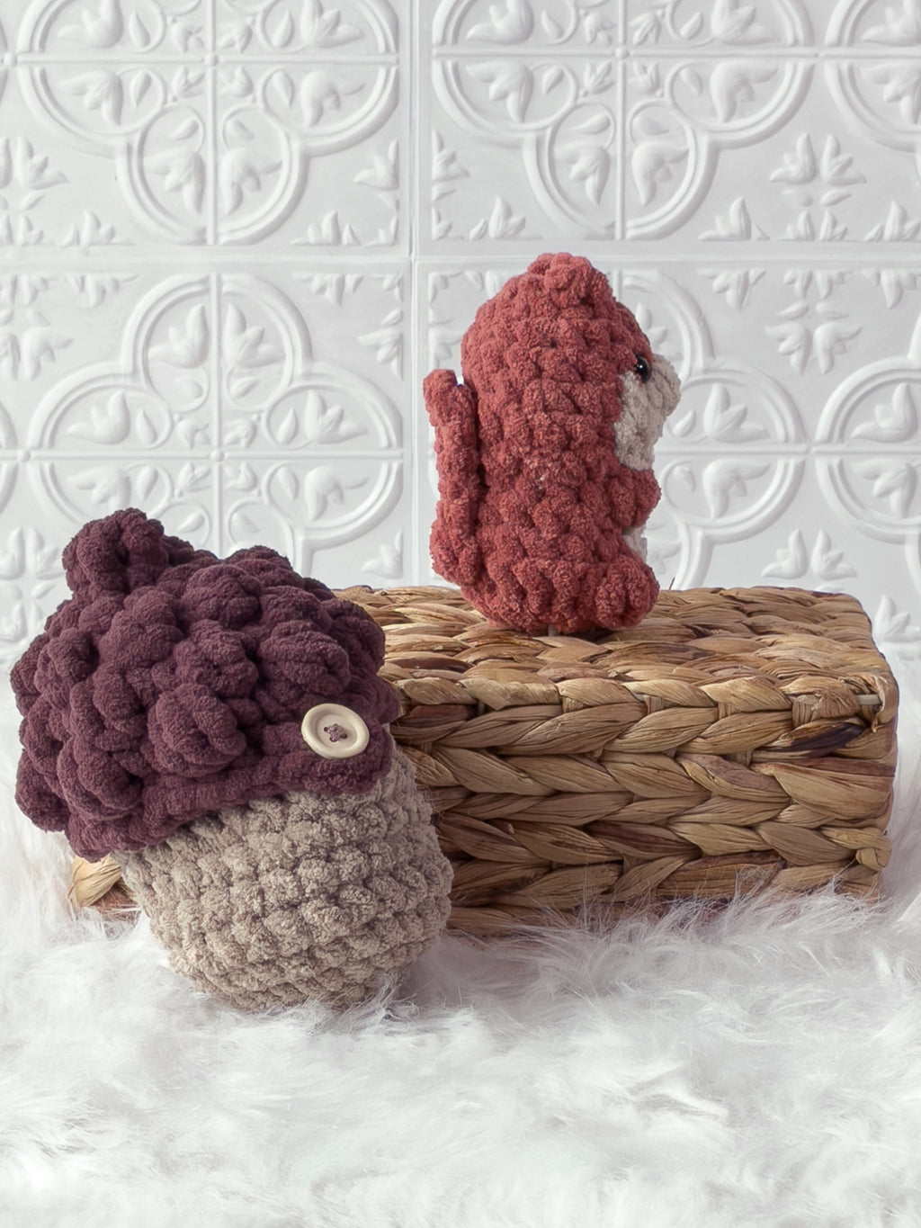 Handmade orange, brown peek a boo squirrel in acorn crochet plushie shown from the side