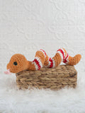 Handmade snake crochet plushie shown from the front
