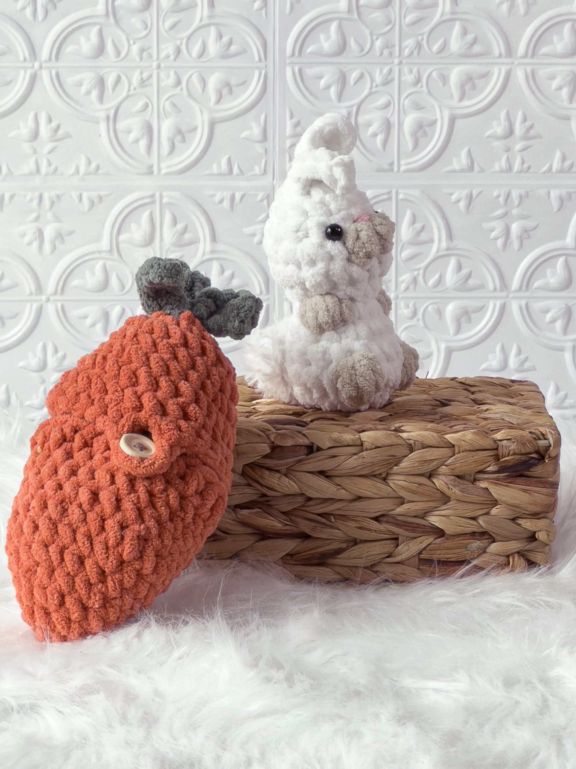 Handmade orange, white peek a boo rabbit in carrot crochet plushie shown from an angled view