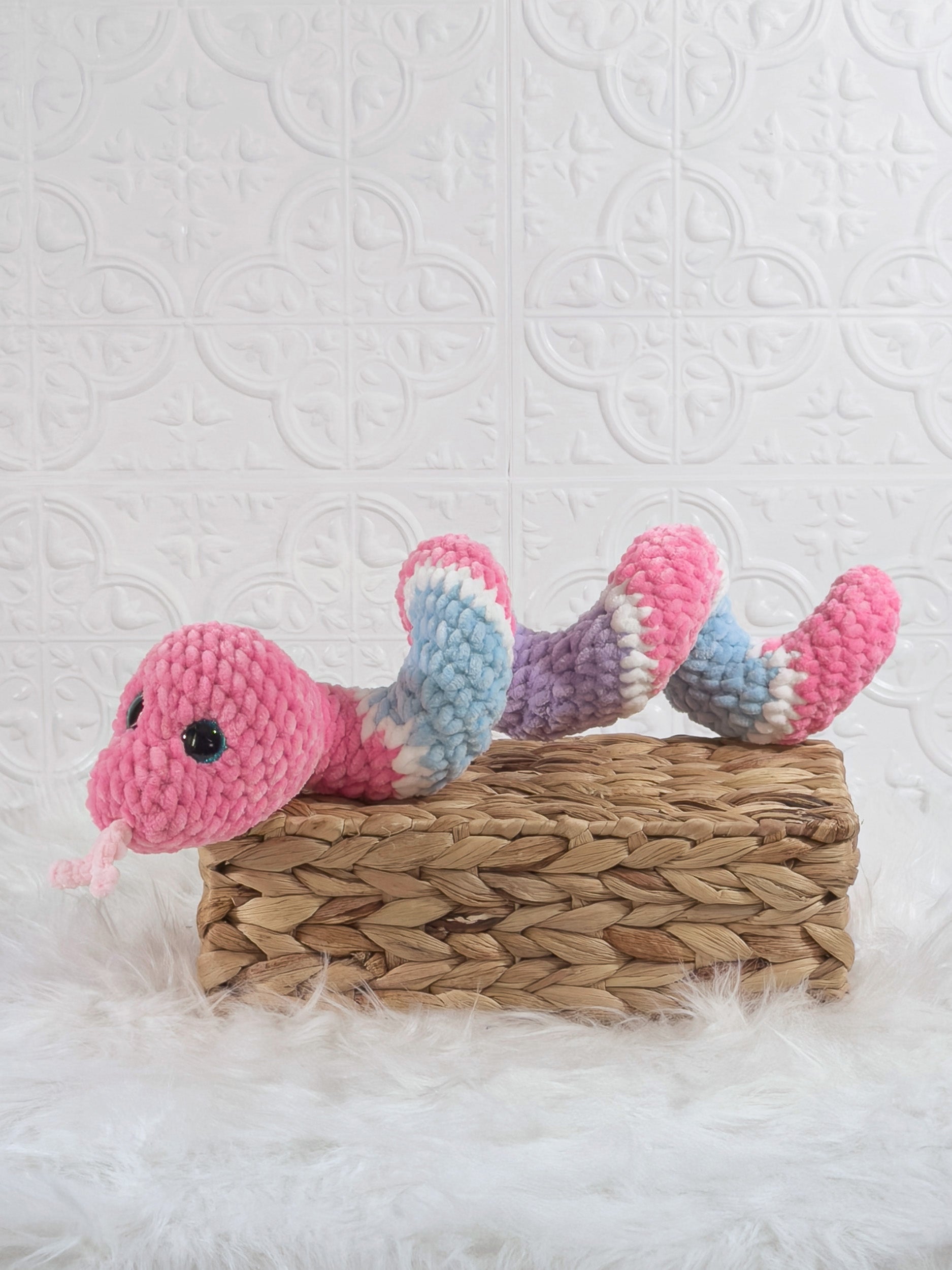 Handmade snake crochet plushie shown from the front