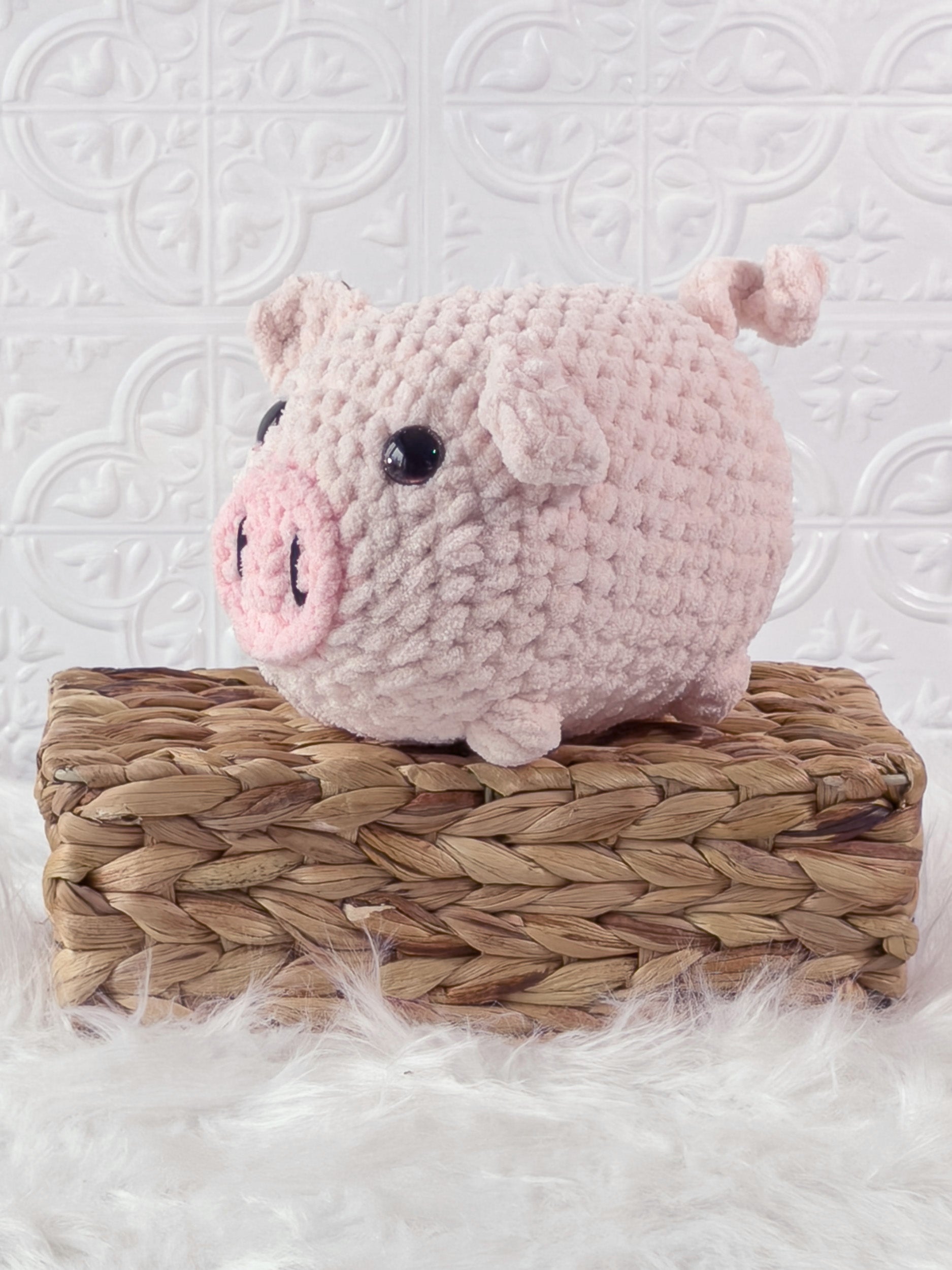 Handmade fat pig crochet plushie with a round chubby body