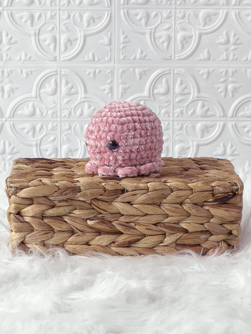 Handmade octopus crochet plushie shown from the front