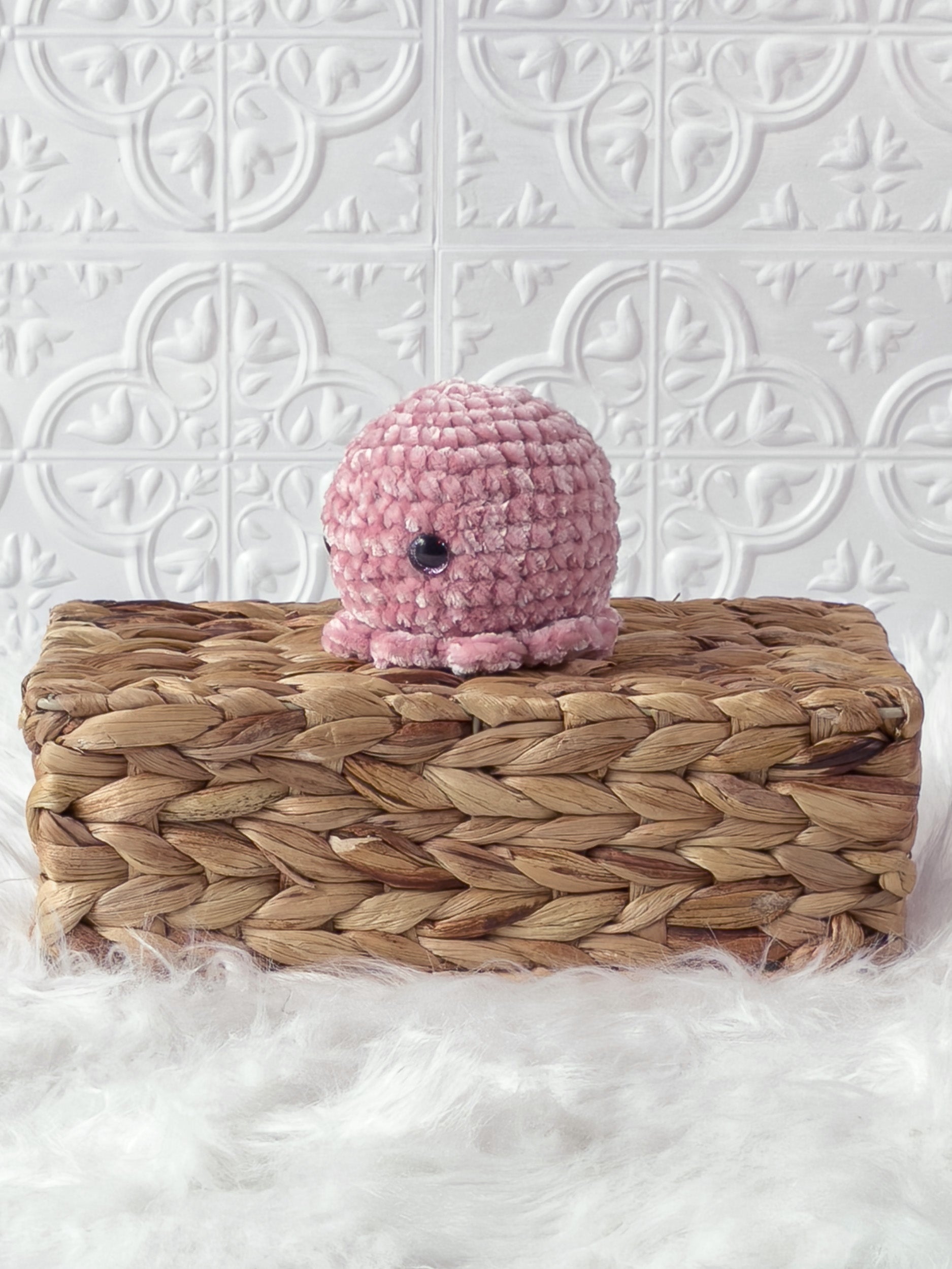 Handmade octopus crochet plushie shown from the front