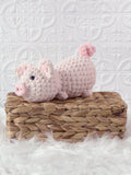 Handmade pig crochet plushie shown from the front