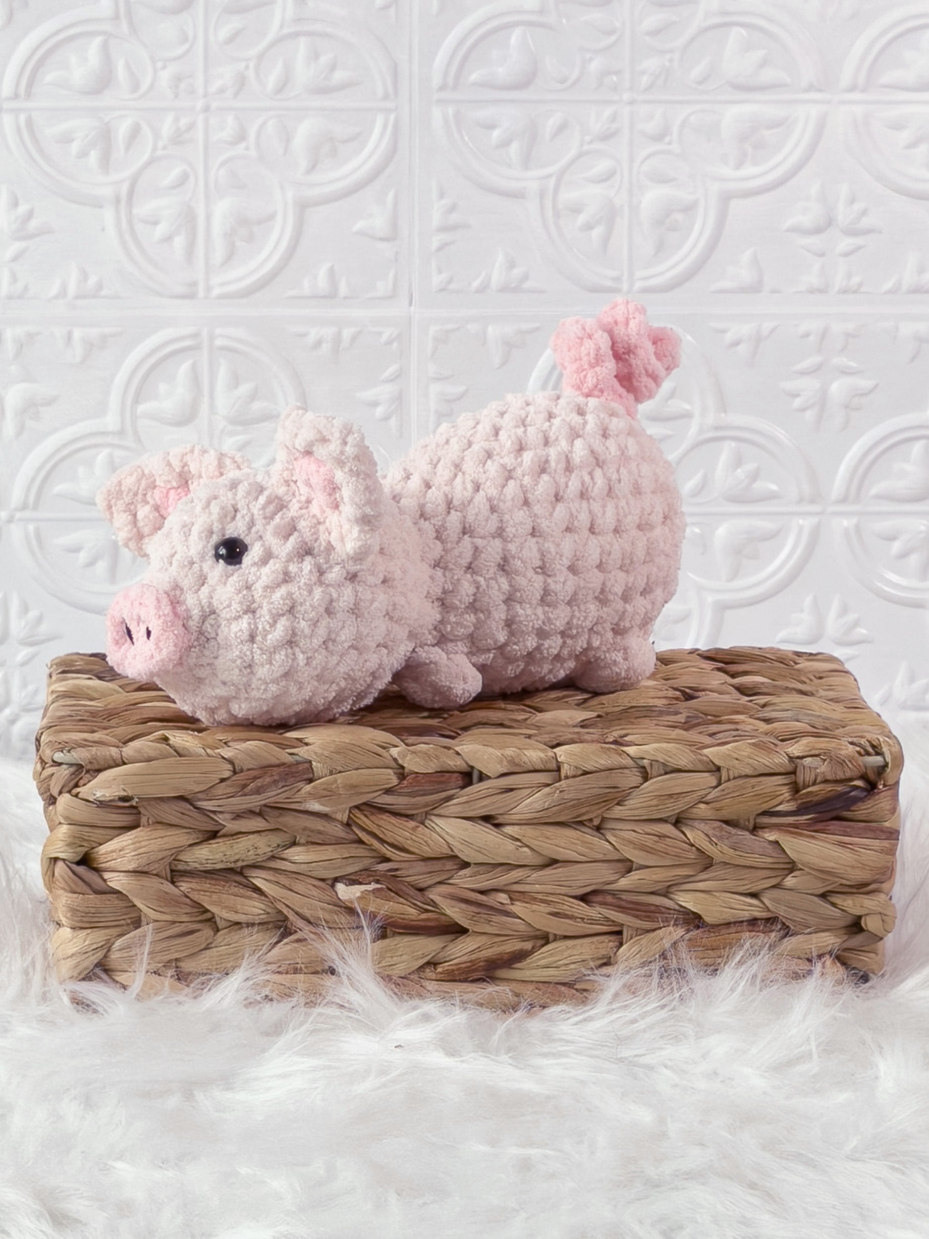 Handmade pig crochet plushie shown from the front