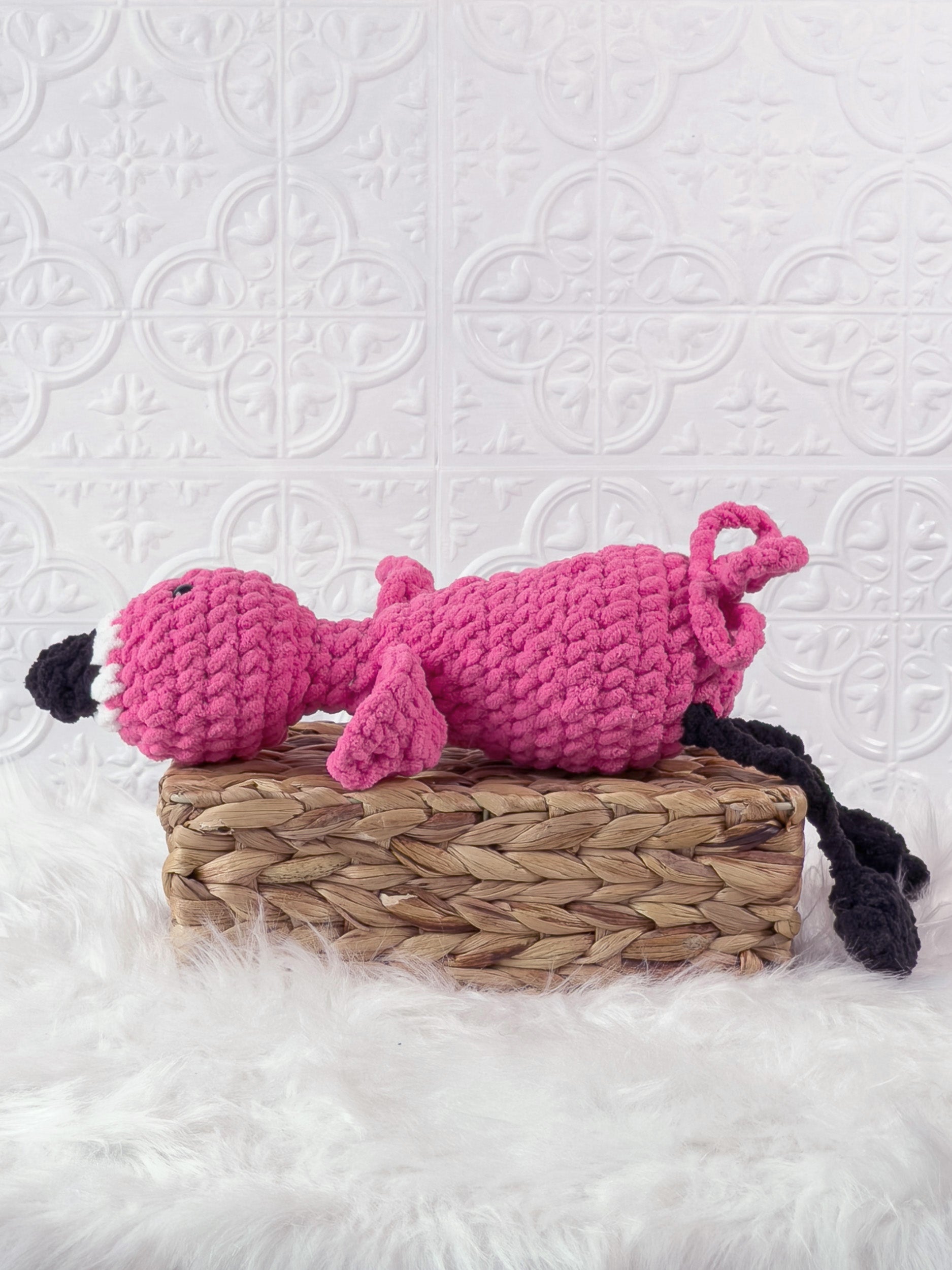 Handmade silly flamingo crochet plushie with a whimsical exaggerated design