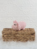 Handmade triceratops crochet plushie shown from the front