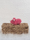 Handmade triceratops crochet plushie shown from the front