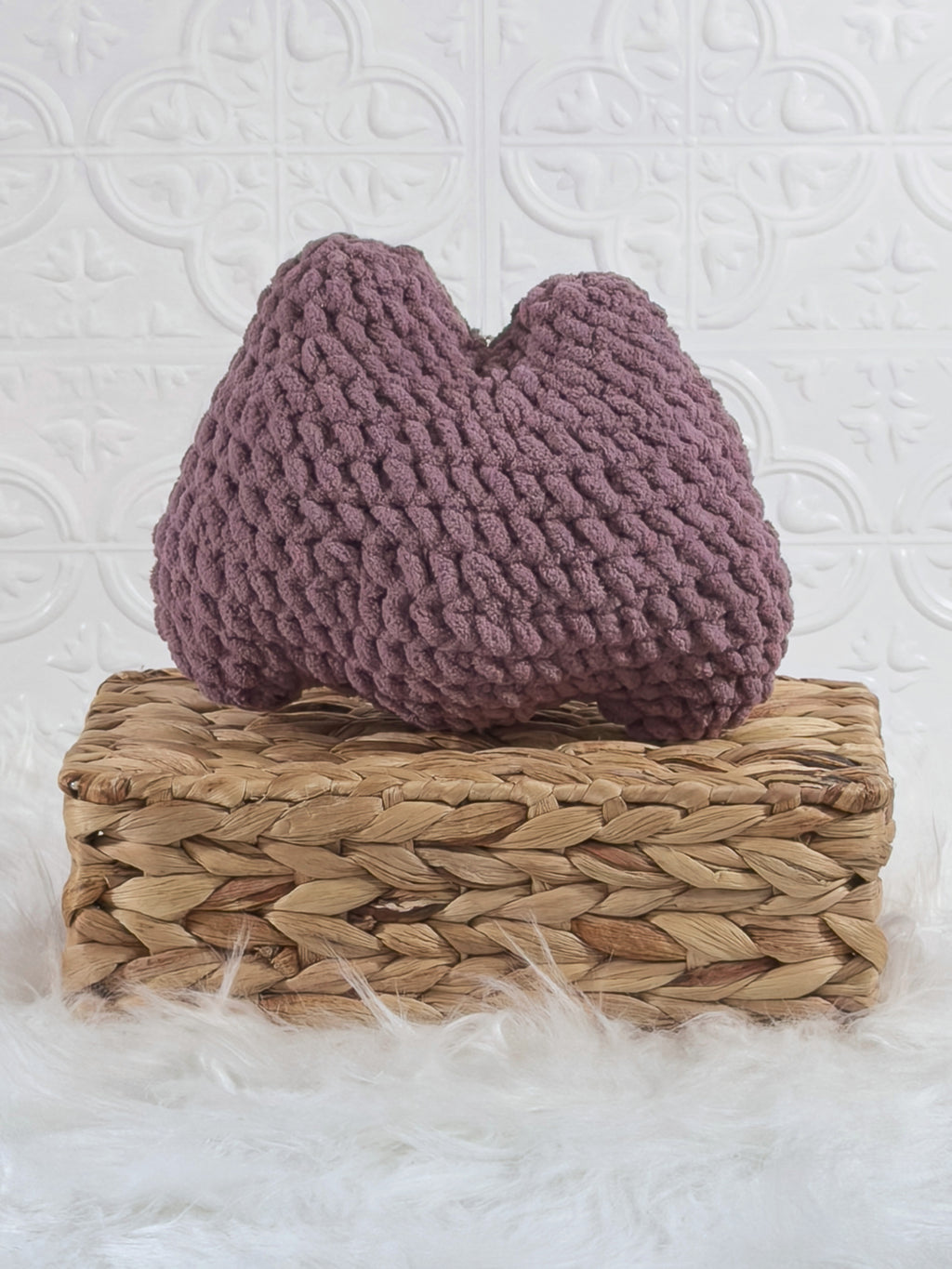 Handmade purple ditto crochet plushie shown from the back