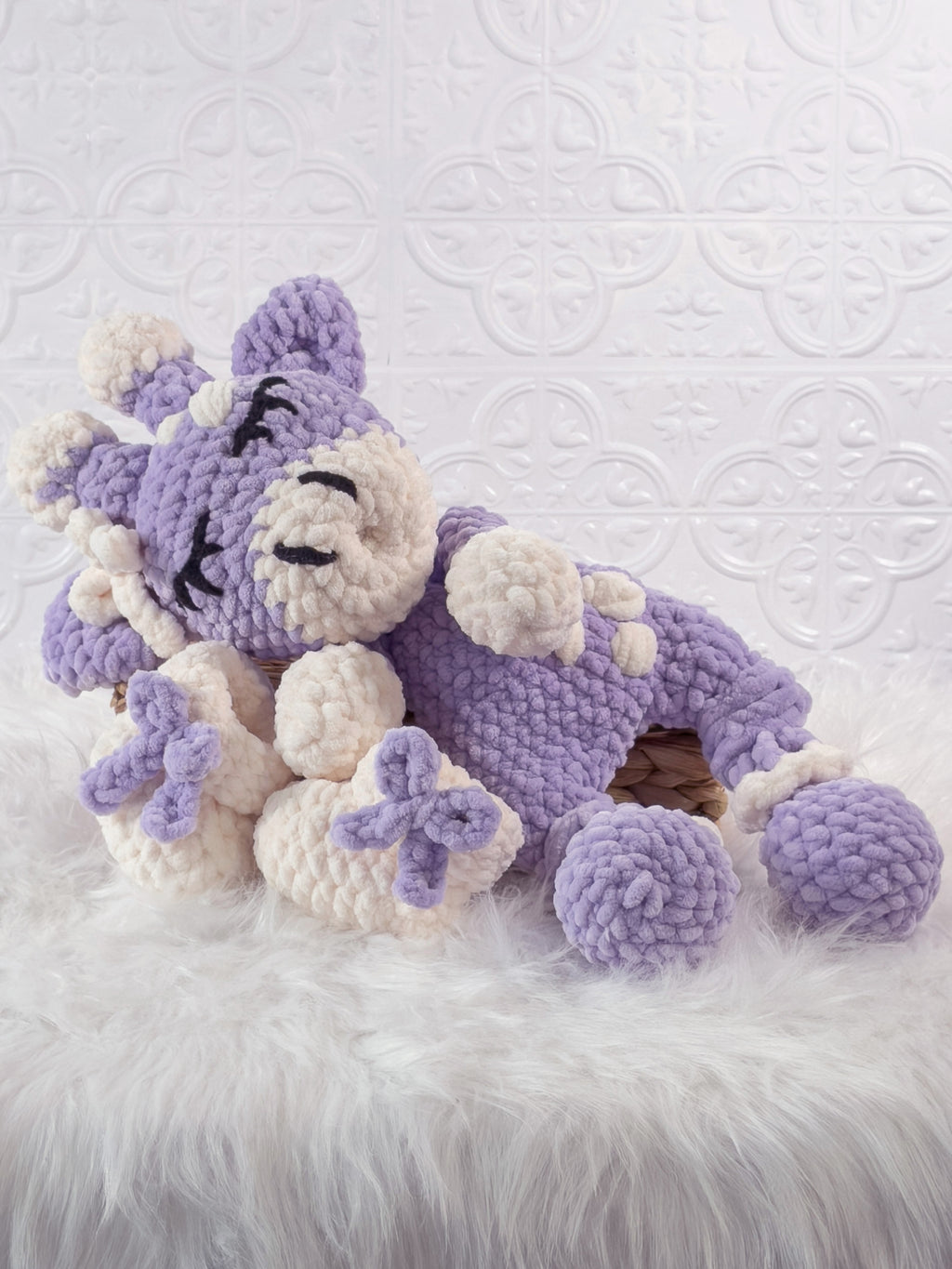 Handmade purple giraffe crochet snuggler shown from the front