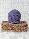 Handmade octopus crochet plushie shown from the front