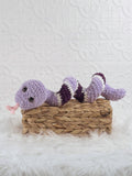 Handmade snake crochet plushie shown from the front