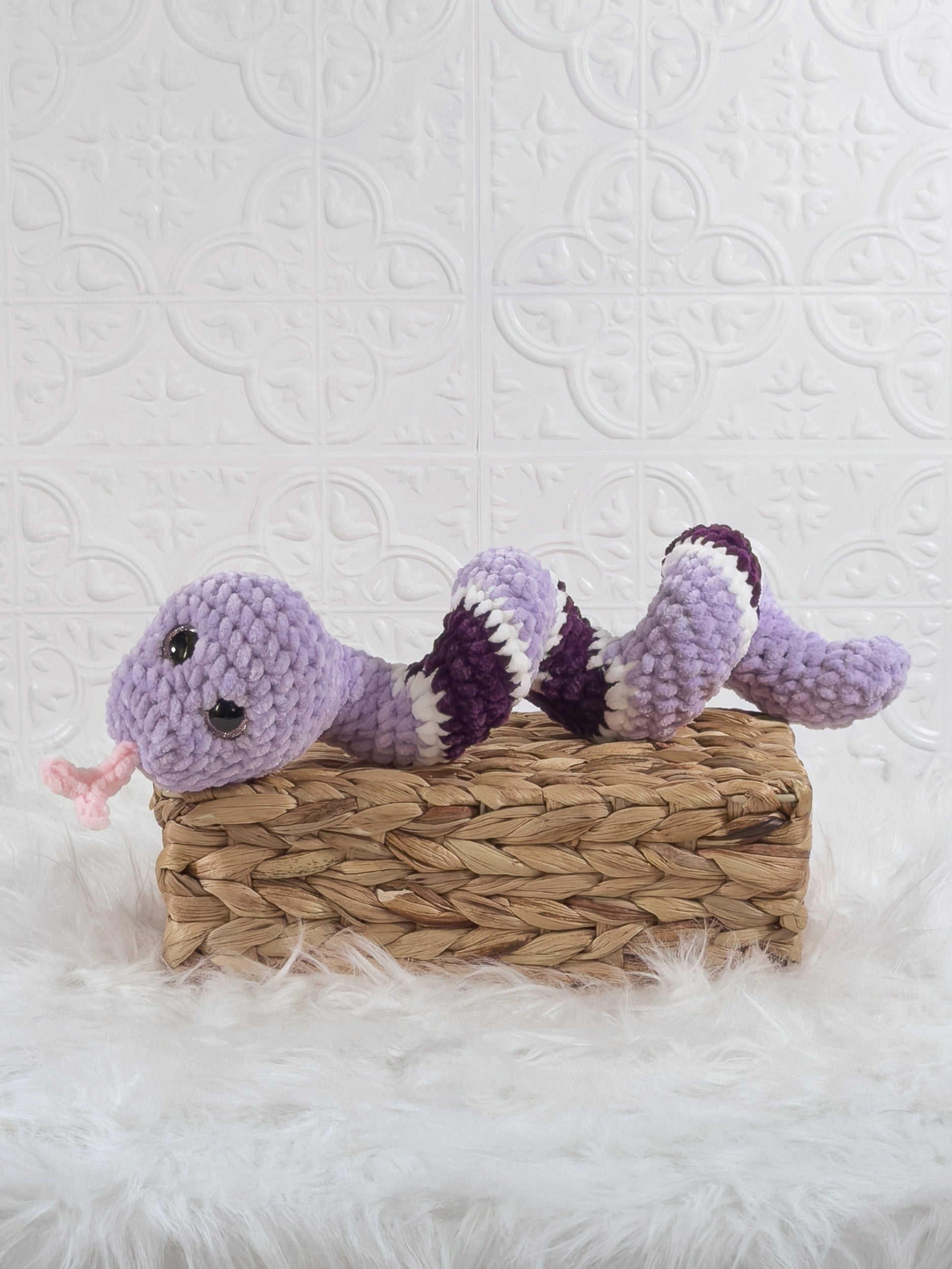 Handmade snake crochet plushie shown from the front