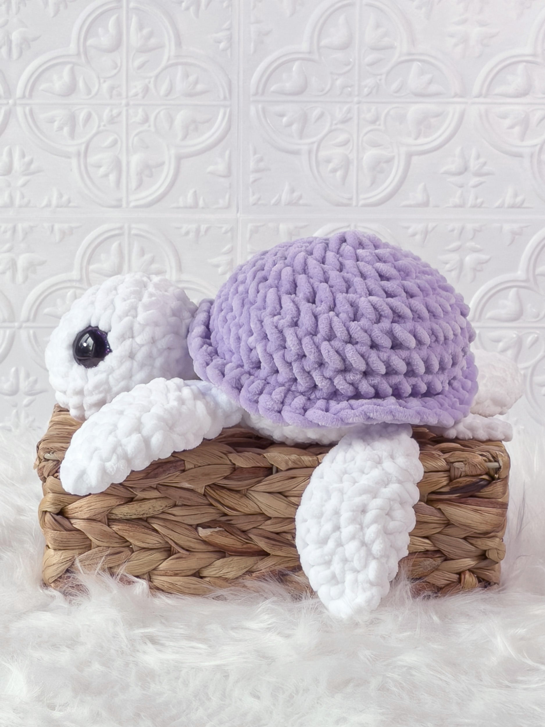 Handmade turtle crochet plushie shown from the front