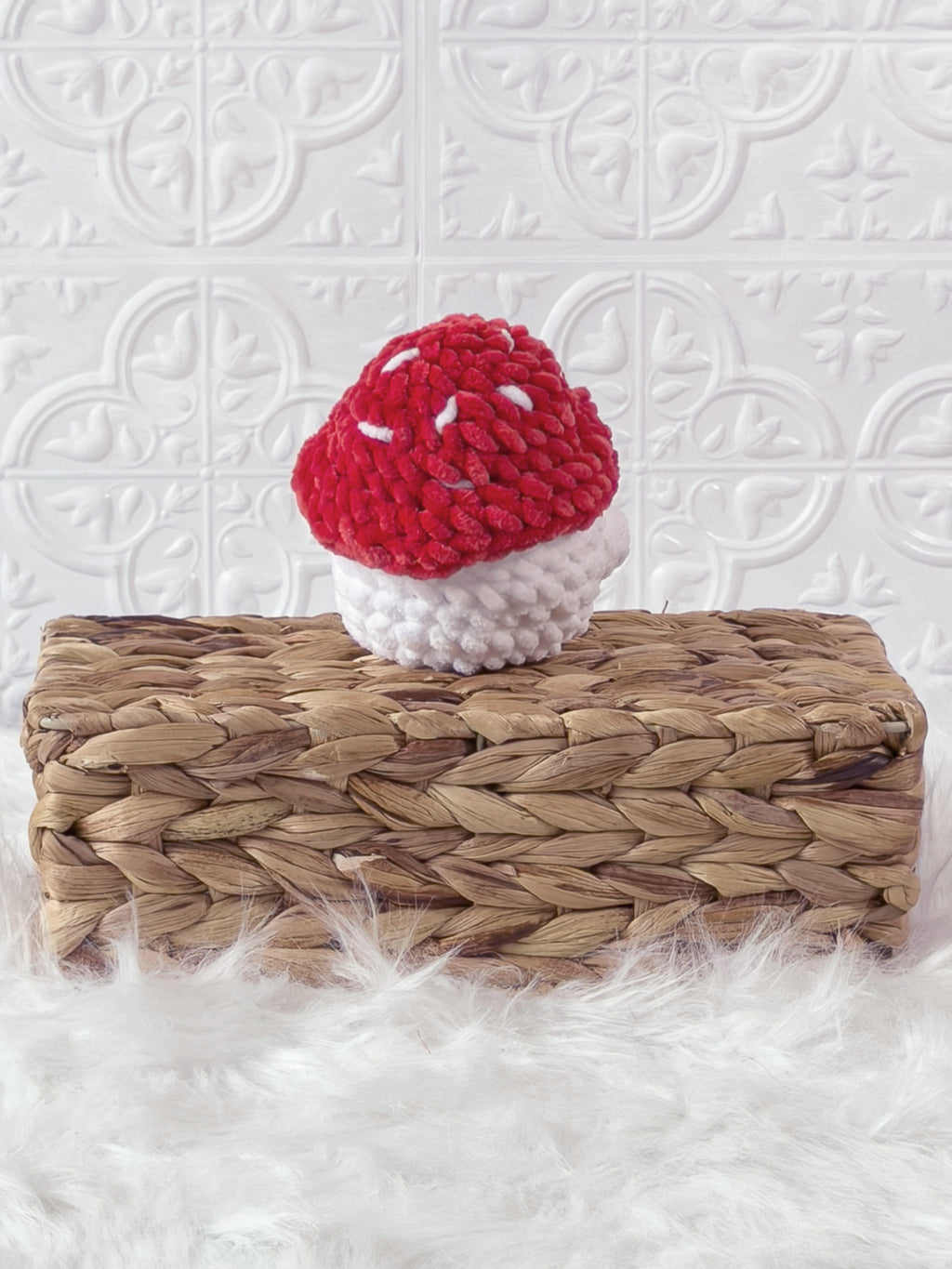 Handmade red chonky mushroom crochet plushie shown from the back