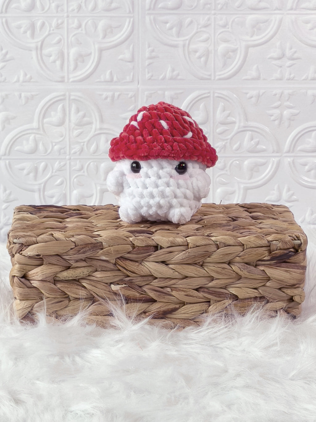 Handmade red chonky mushroom crochet plushie shown from the front