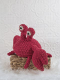 Handmade crab crochet plushie shown from the front