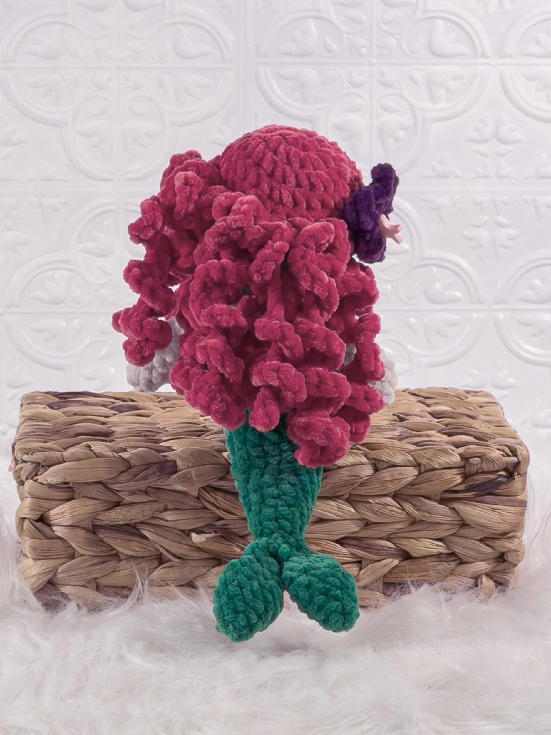 Handmade red mermaid crochet plushie shown from the back