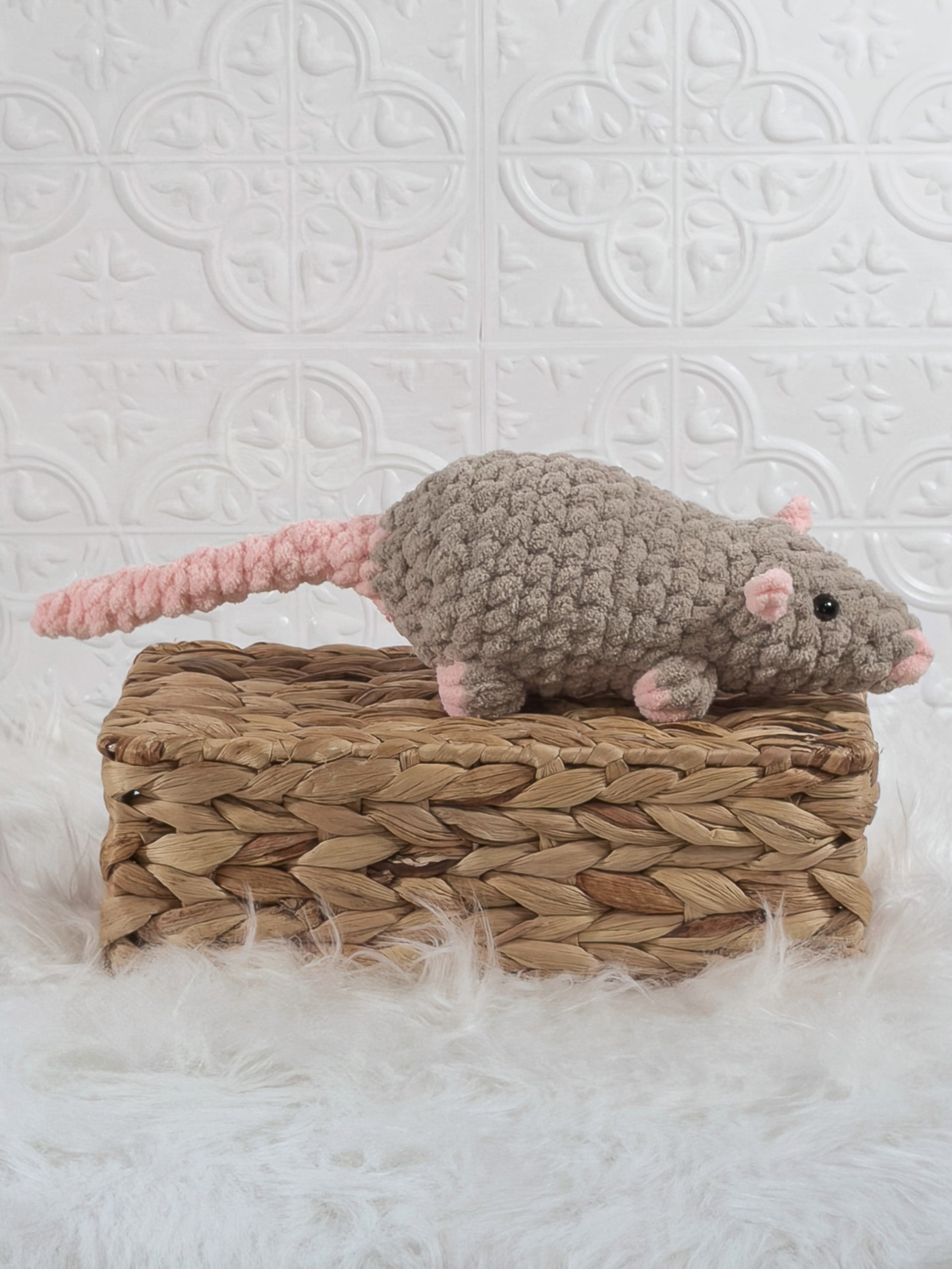 Handmade taupe rat crochet plushie shown from the side