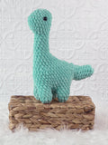 Handmade brachiosaurus crochet plushie shown from the front