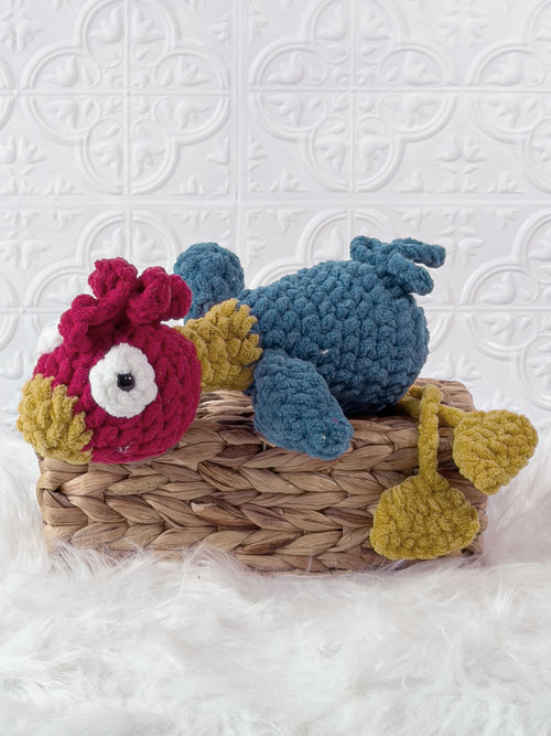 Handmade silly rooster crochet plushie with a whimsical exaggerated design