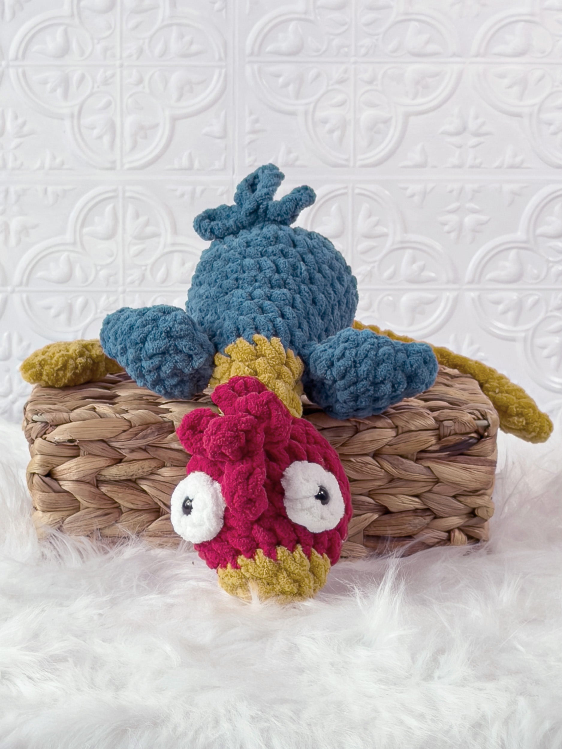 Handmade turquoise silly rooster crochet plushie shown from the front