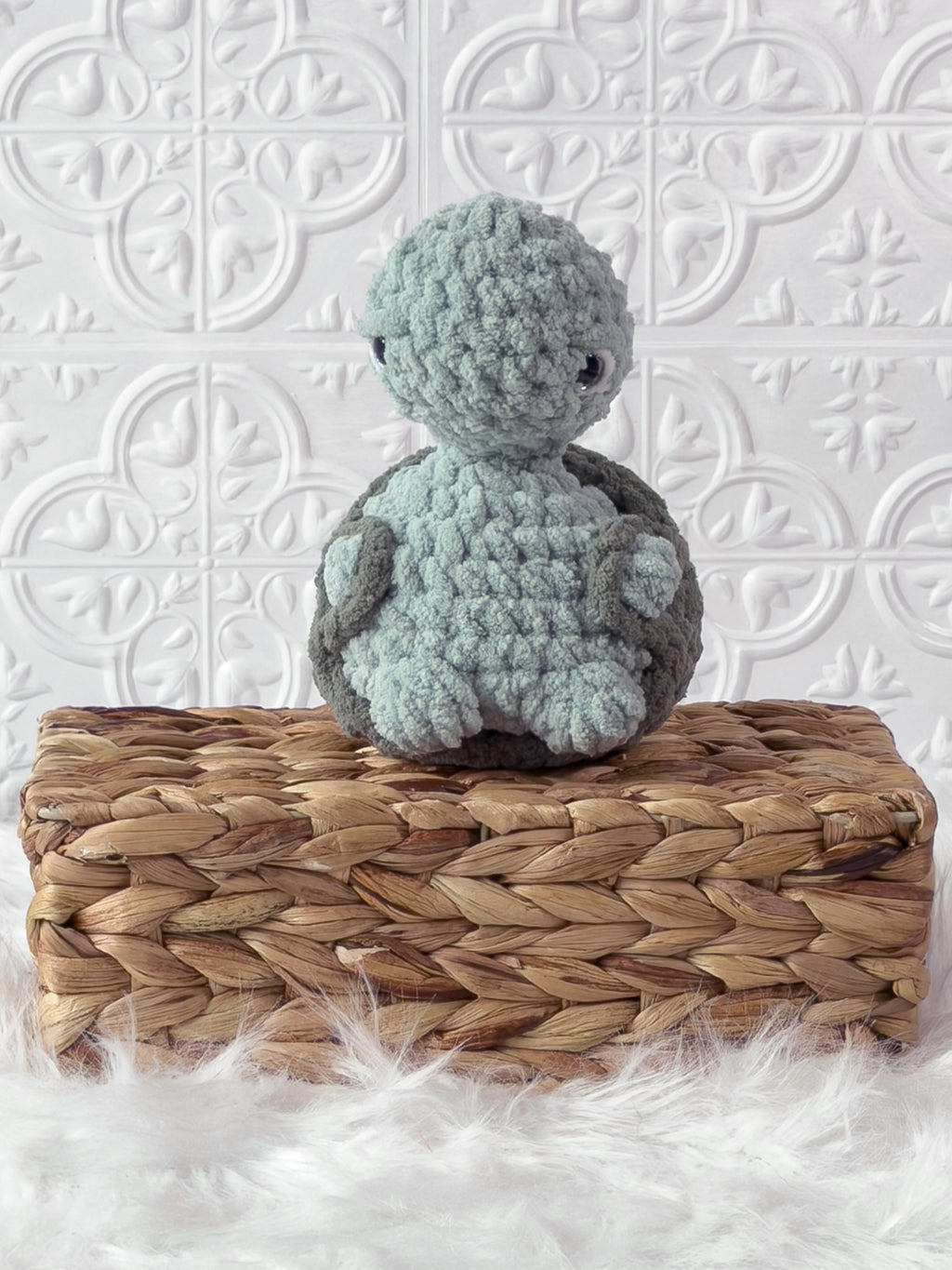 Handmade turquoise, medium turtle crochet plushie shown from the front