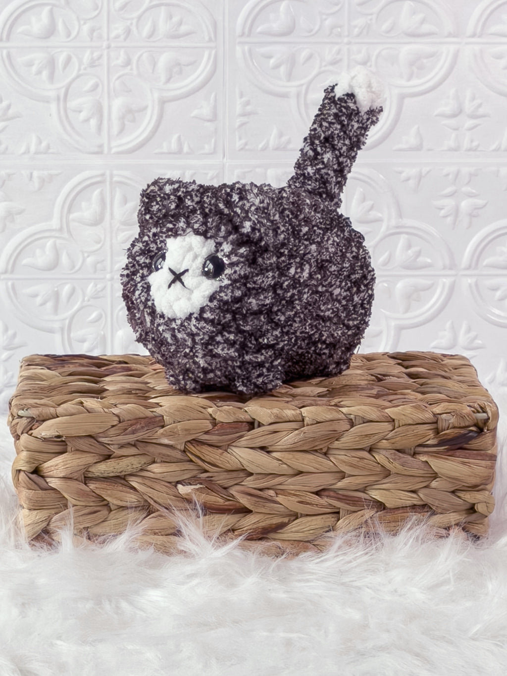 Handmade loaf cat crochet plushie with a rounded bread-loaf shape