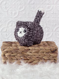 Handmade loaf cat crochet plushie with a rounded bread-loaf shape