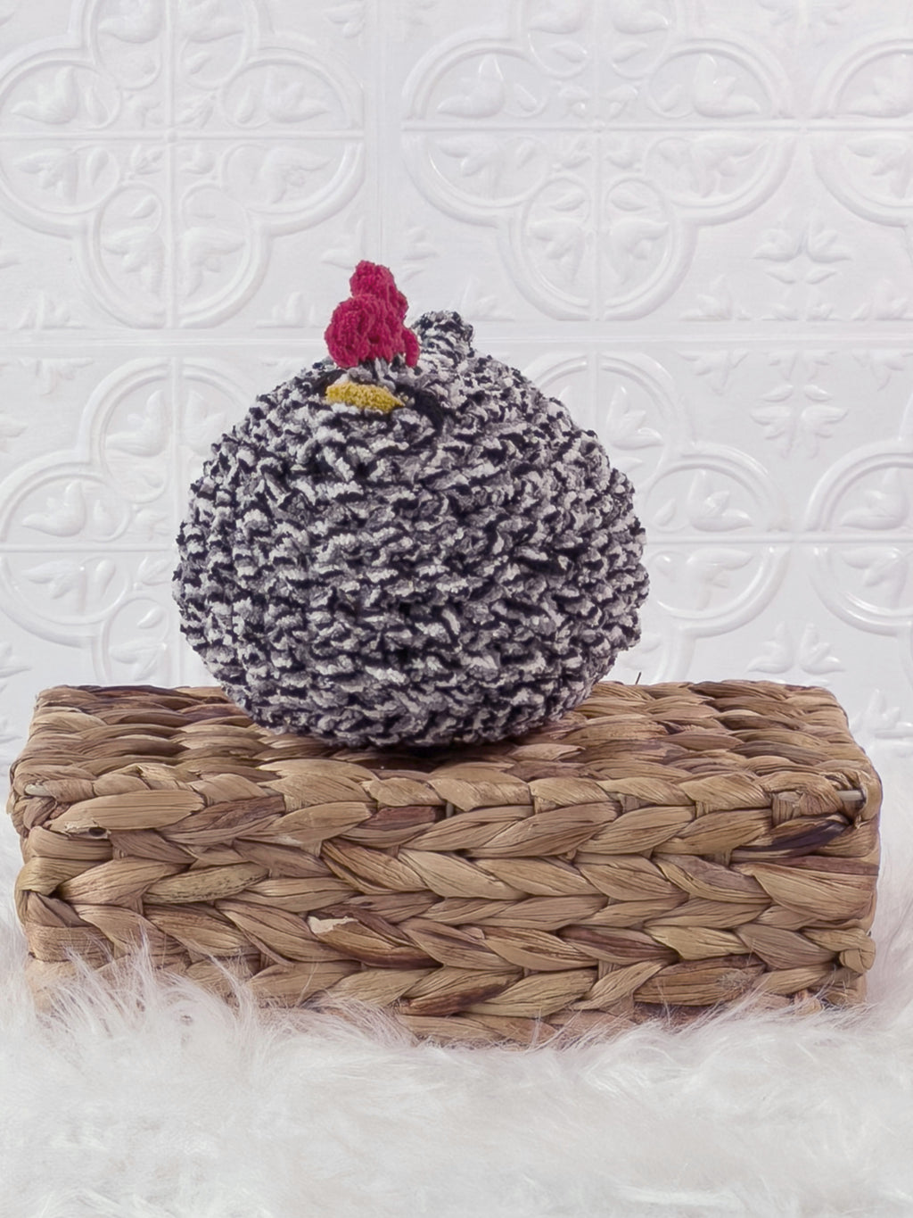 Handmade tweed, black chicken crochet plushie shown from the front
