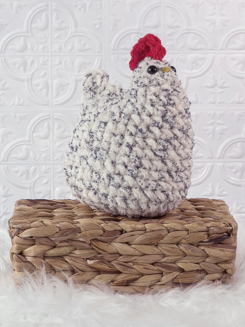 Handmade tweed, cream chicken crochet plushie shown from an angled view