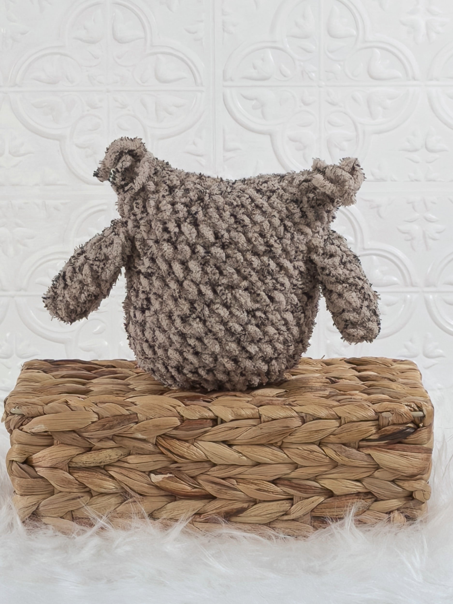 Handmade tweed owl crochet plushie shown from the back