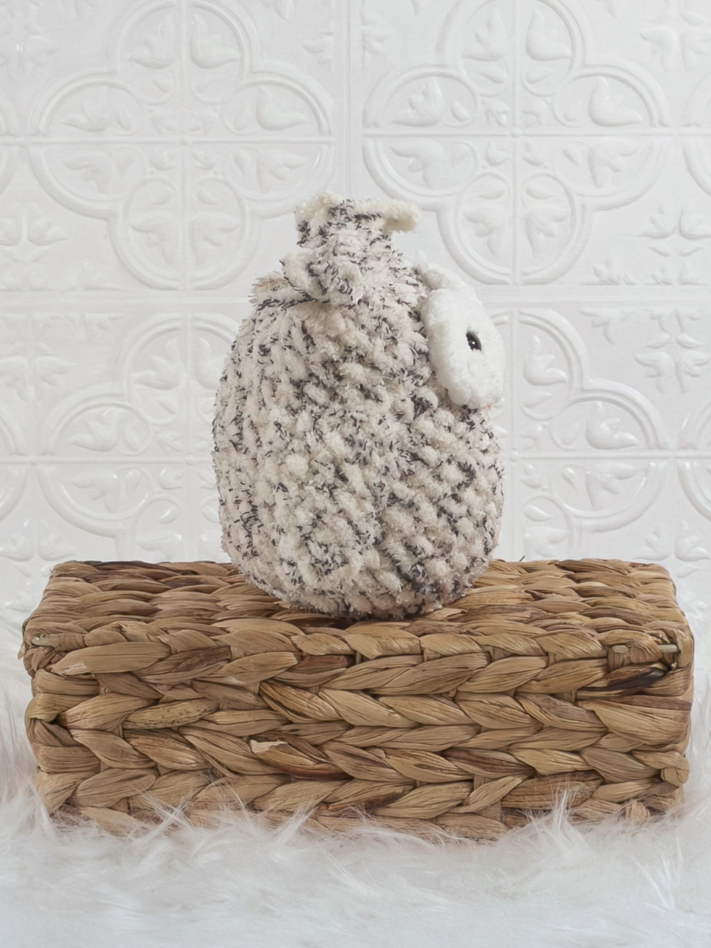 Handmade tweed owl crochet plushie shown from the side